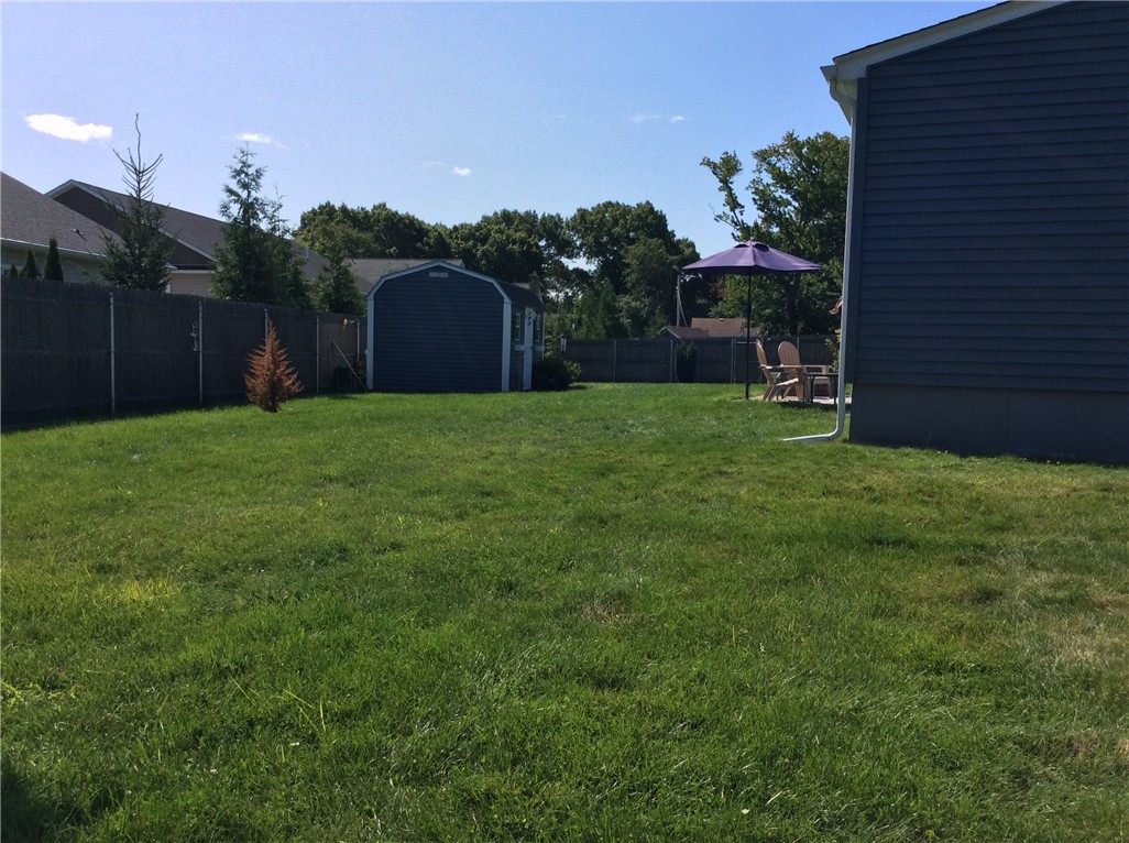 18 Mellon Road Warwick, RI 02889 - Photo 31 of 44 Rear fenced yard. Full sprinklers
