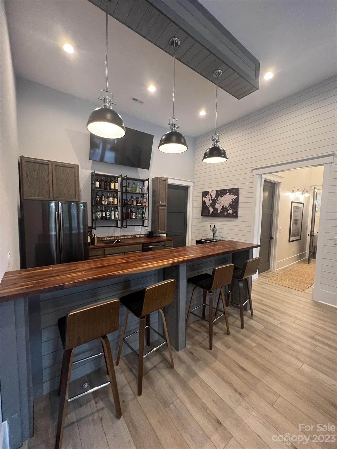370 Calming Way Tega Cay, SC 29708 - Photo 17 of 24 a group of chairs sitting in kitchen and dining room