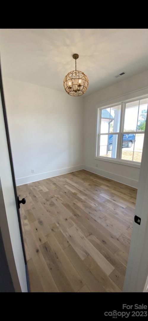 370 Calming Way Tega Cay, SC 29708 - Photo 3 of 24 a view of an empty room with a window