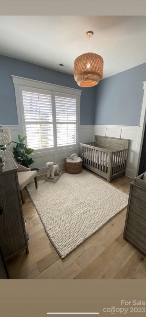 370 Calming Way Tega Cay, SC 29708 - Photo 5 of 24 a bedroom with a bed and window