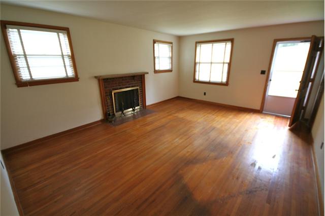 1003 Mitchell Road Nashville, TN 37206 - Photo 2 of 9 HARDWOOD FLOORING IN THE GREAT ROOM AND A FIREPLACE