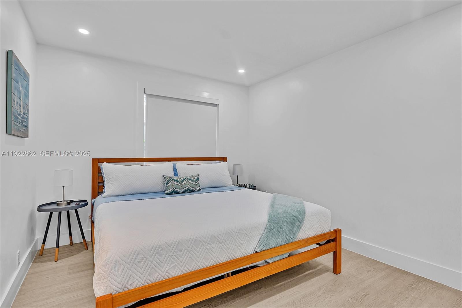 1960 Riverside Drive Fort Lauderdale, FL 33312 - Photo 18 of 89 a bedroom with a bed and a rug