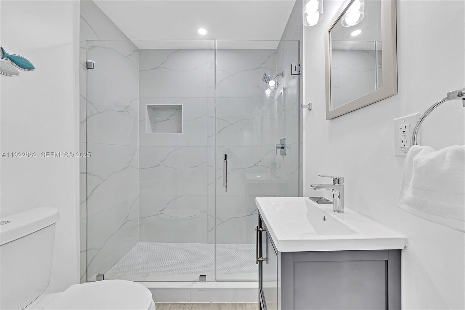 1960 Riverside Drive Fort Lauderdale, FL 33312 - Photo 41 of 89 a bathroom with a bathtub shower sink vanity and toilet