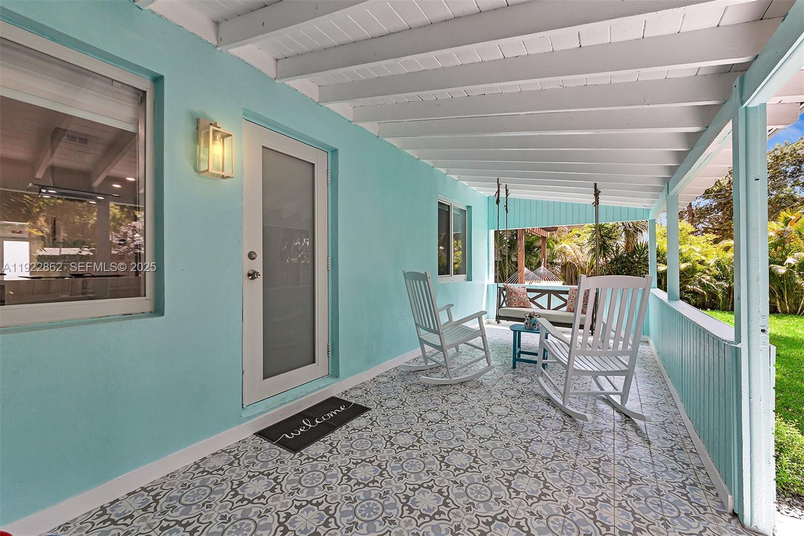 1960 Riverside Drive Fort Lauderdale, FL 33312 - Photo 60 of 89 a dining room with furniture and a window