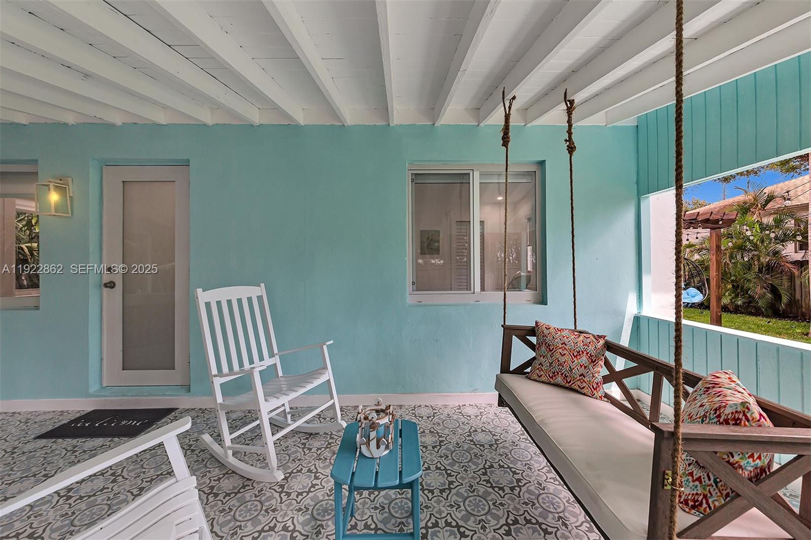 1960 Riverside Drive Fort Lauderdale, FL 33312 - Photo 68 of 89 a living room with furniture and a flat screen tv