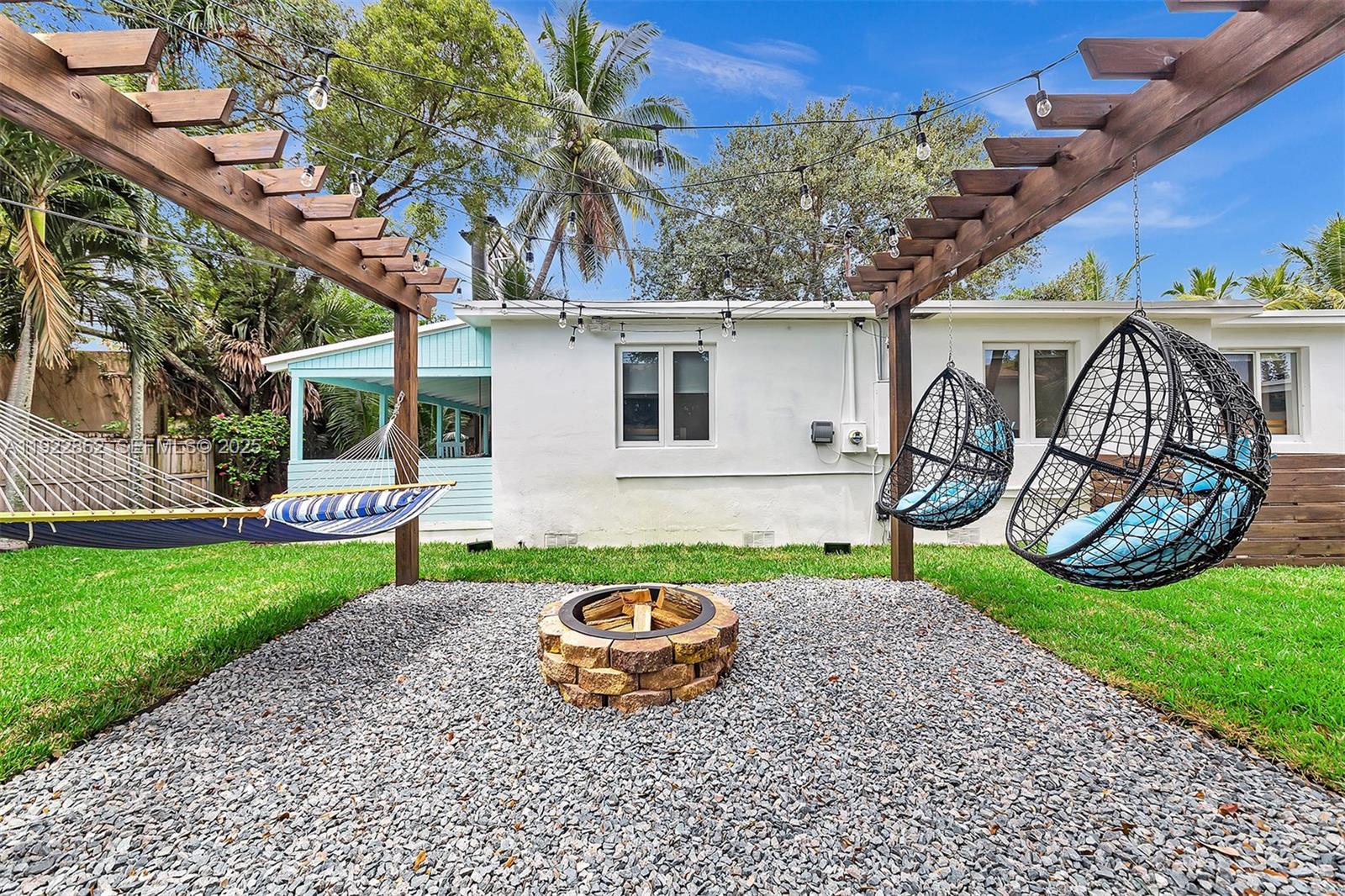 1960 Riverside Drive Fort Lauderdale, FL 33312 - Photo 74 of 89 a car parked in front of a house with a yard