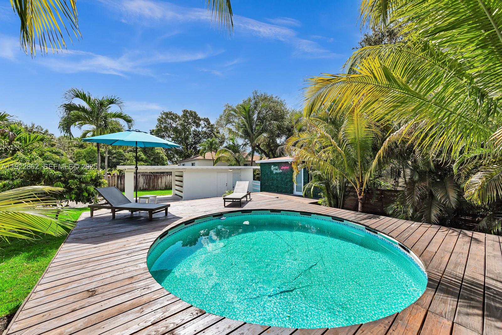 1960 Riverside Drive Fort Lauderdale, FL 33312 - Photo 80 of 89 a view of a swimming pool with a patio