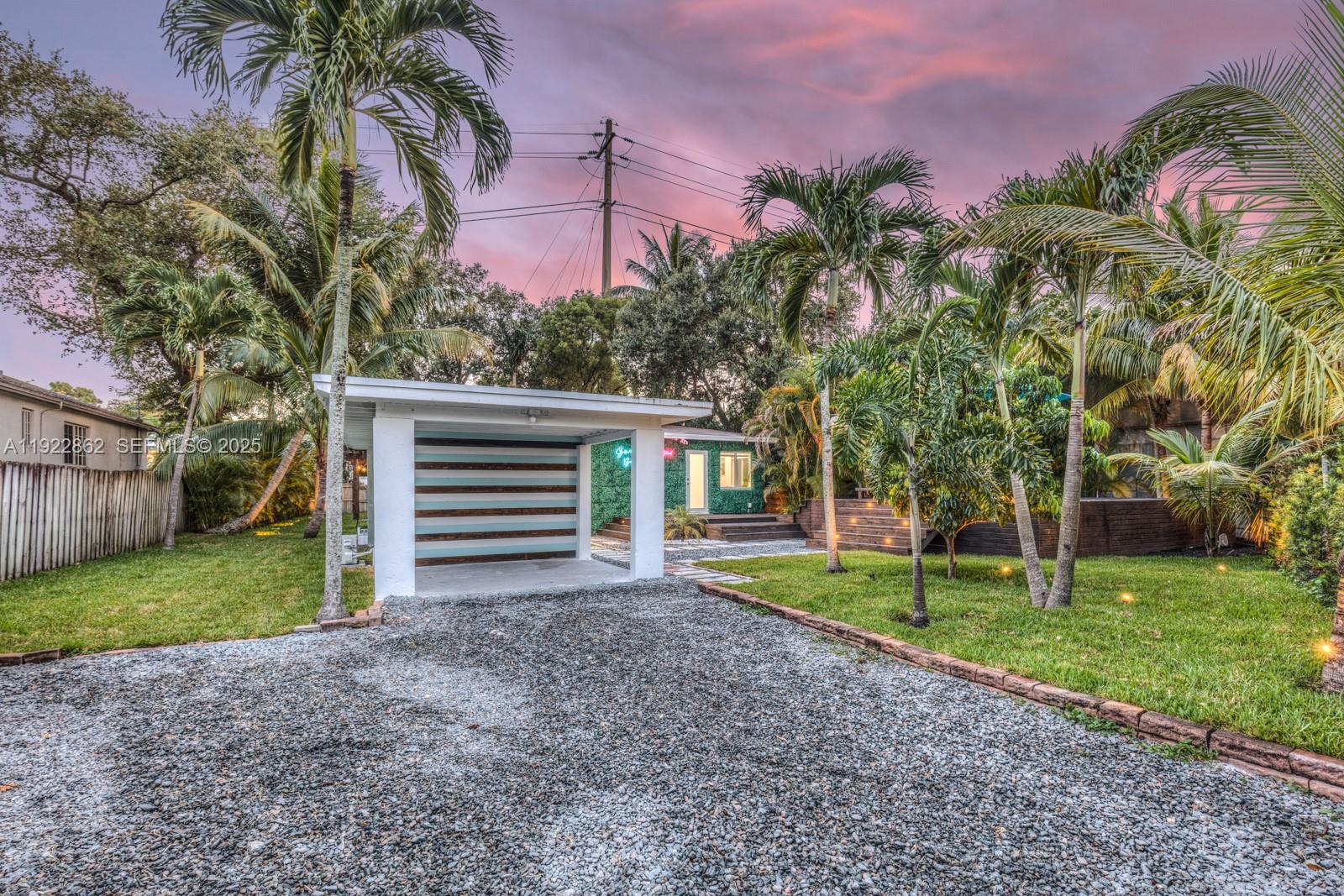 1960 Riverside Drive Fort Lauderdale, FL 33312 - Photo 85 of 89 a view of a house with a yard and plant