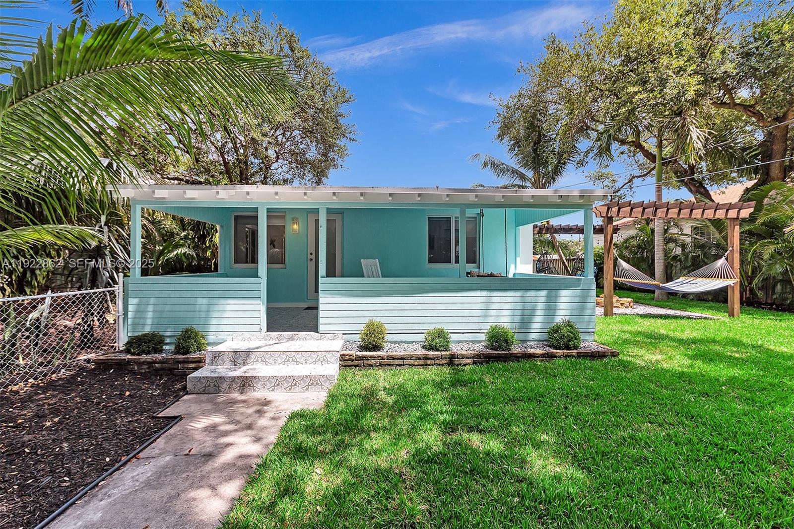 1960 Riverside Drive Fort Lauderdale, FL 33312 - Photo 89 of 89 a view of a house with a yard