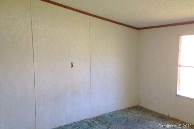 5237 Dutch Cove Road Canton, NC 28716 - Photo 5 of 7 a view of small space with wooden floor and a window