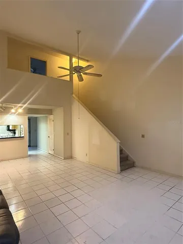 a view of a hallway with a window