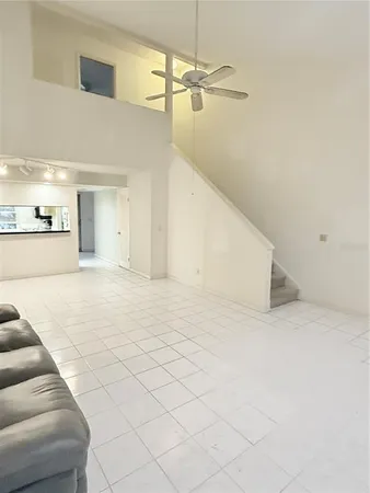 a view of a hallway with a couch