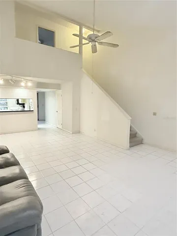 a view of a hallway with a couch