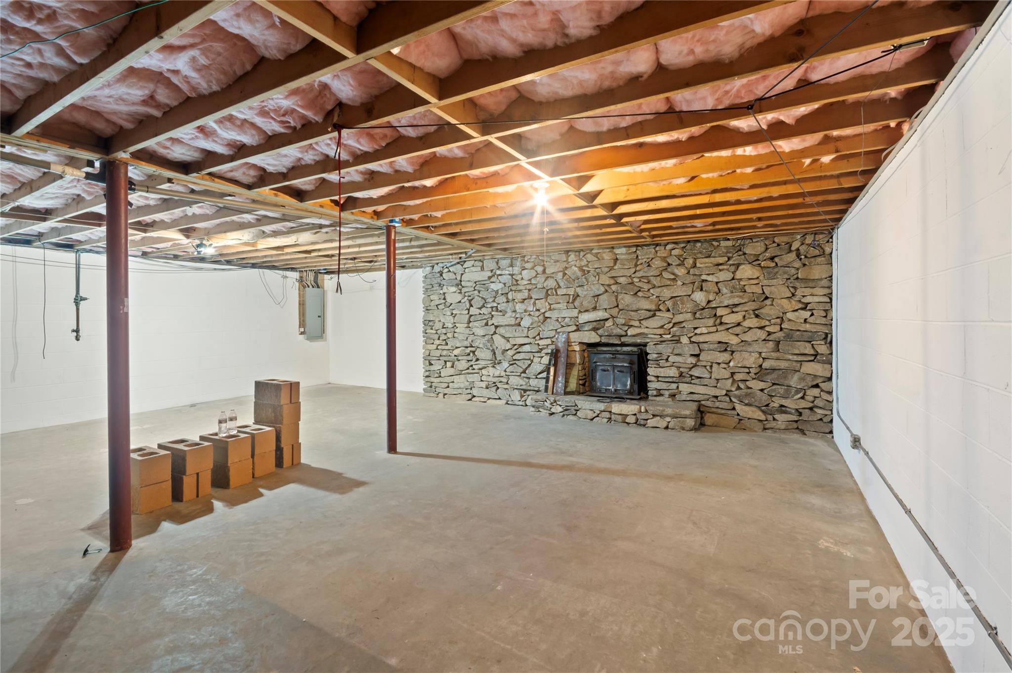 90 Joe Jenkins Road Fairview, NC 28730 - Photo 30 of 46 a view of a room with wooden floor and fireplace