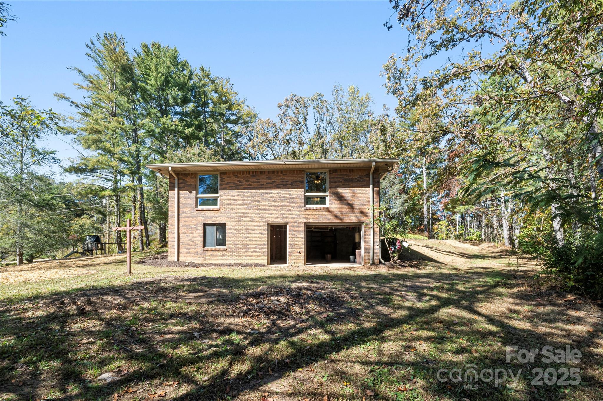 90 Joe Jenkins Road Fairview, NC 28730 - Photo 36 of 46 a view of a house with a yard