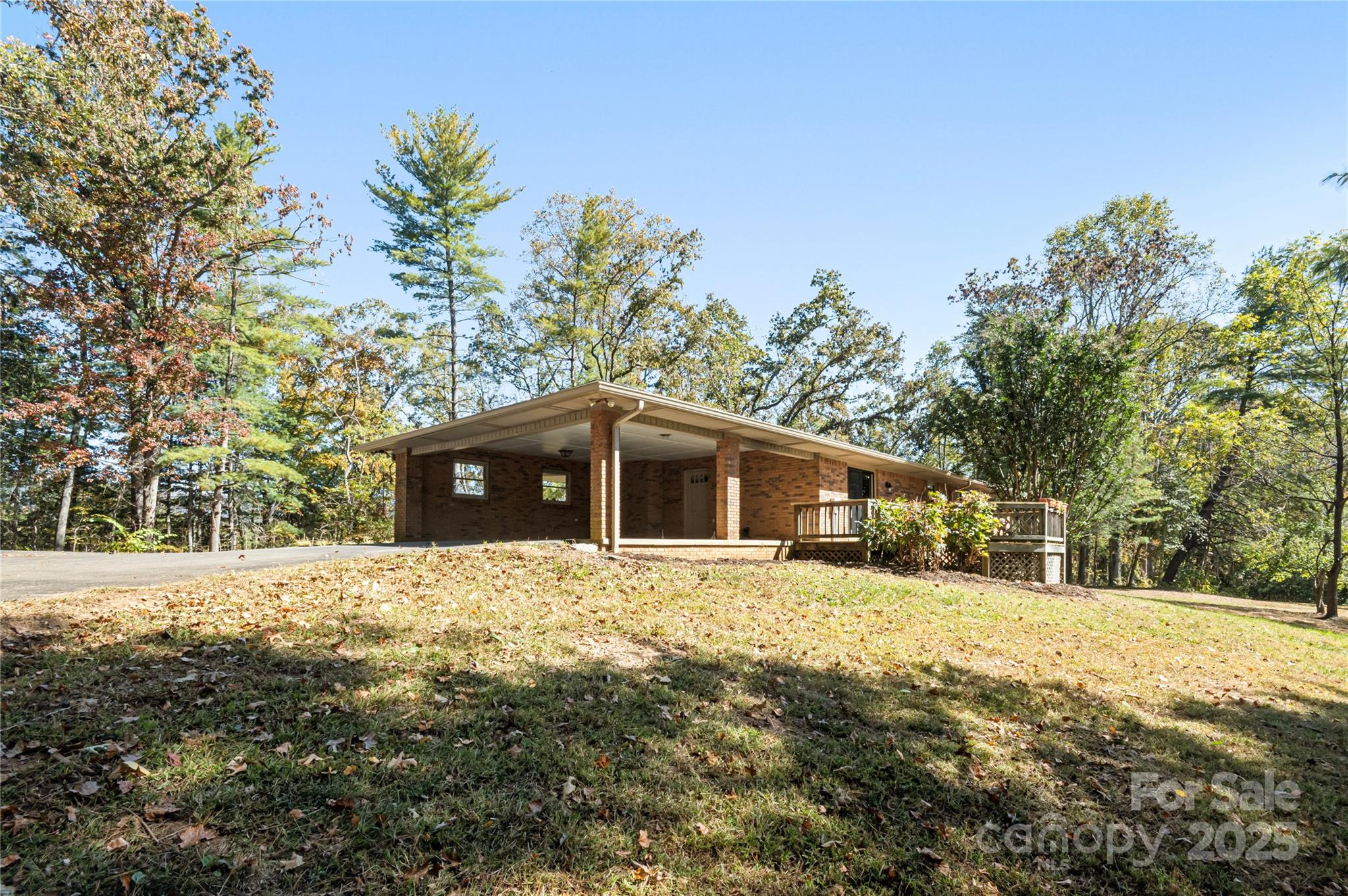 90 Joe Jenkins Road Fairview, NC 28730 - Photo 38 of 46 a front view of a house with a yard