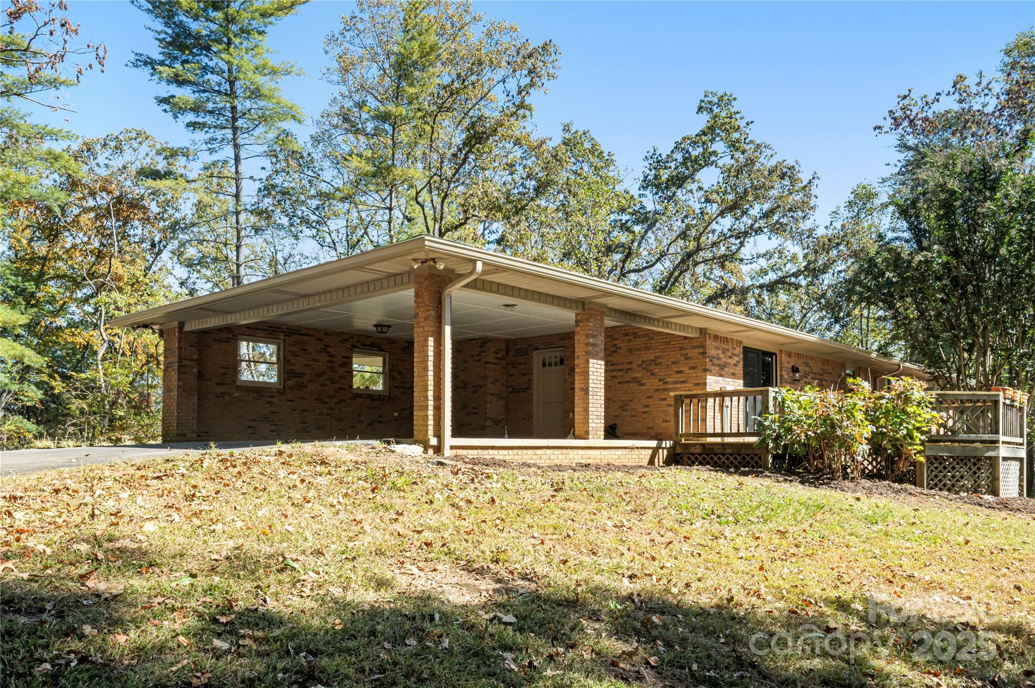 90 Joe Jenkins Road Fairview, NC 28730 - Photo 39 of 46 a front view of a house with a yard