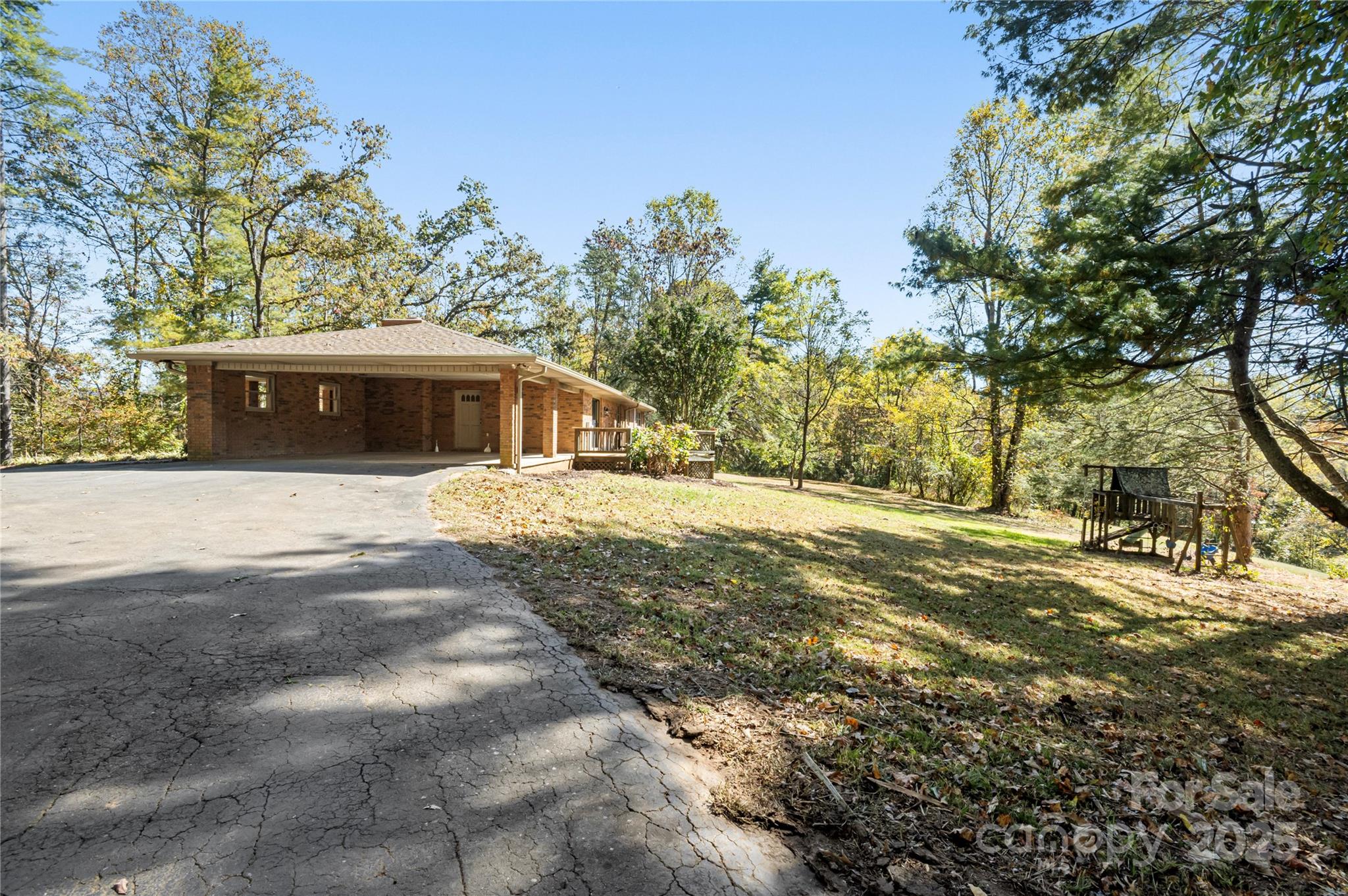 90 Joe Jenkins Road Fairview, NC 28730 - Photo 45 of 46 a view of residential houses with yard and trees