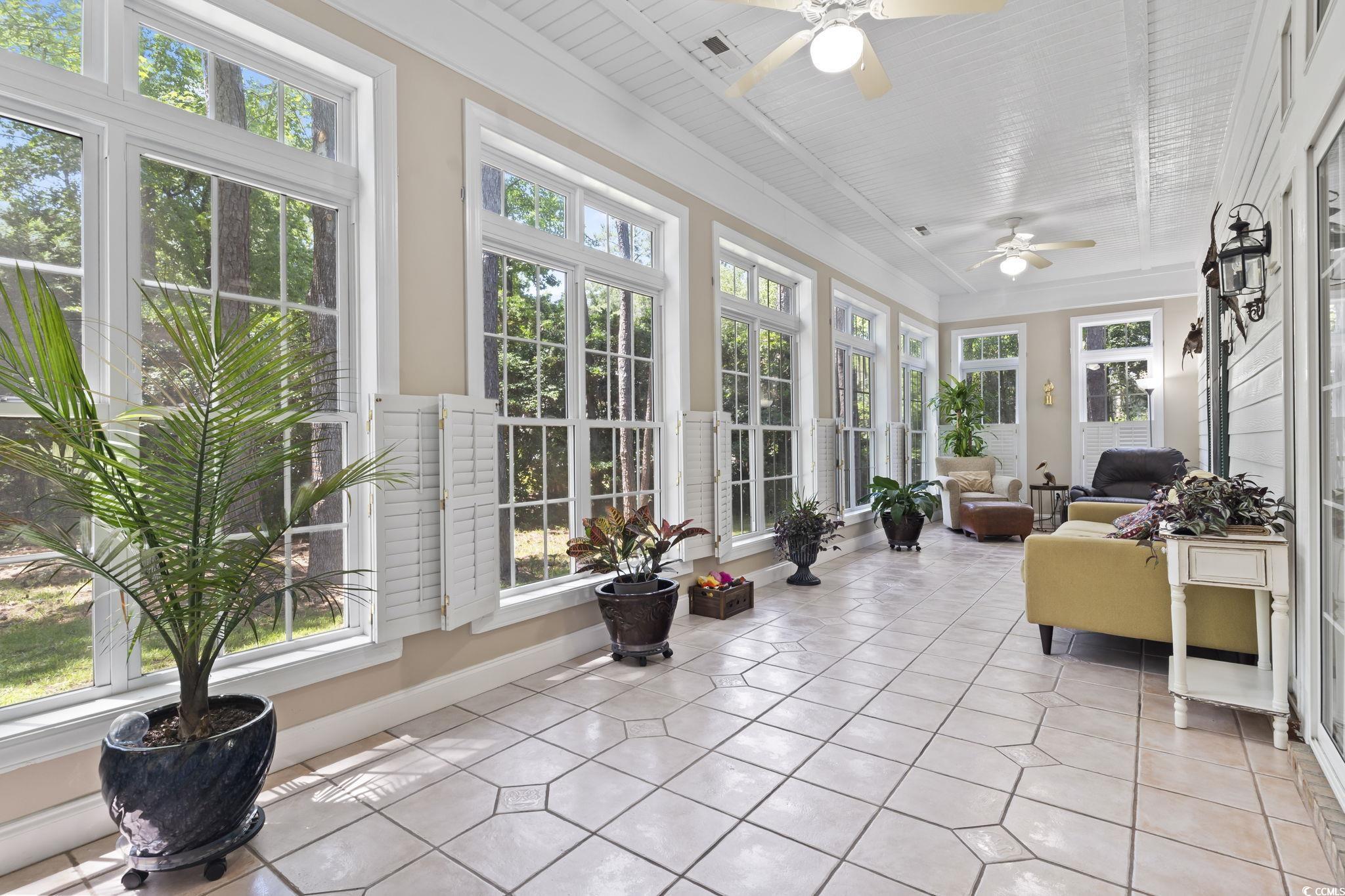 4495 Trotters Court Murrells Inlet, SC 29576 - Photo 28 of 29 Sunroom with tile patterned floors and baseboards