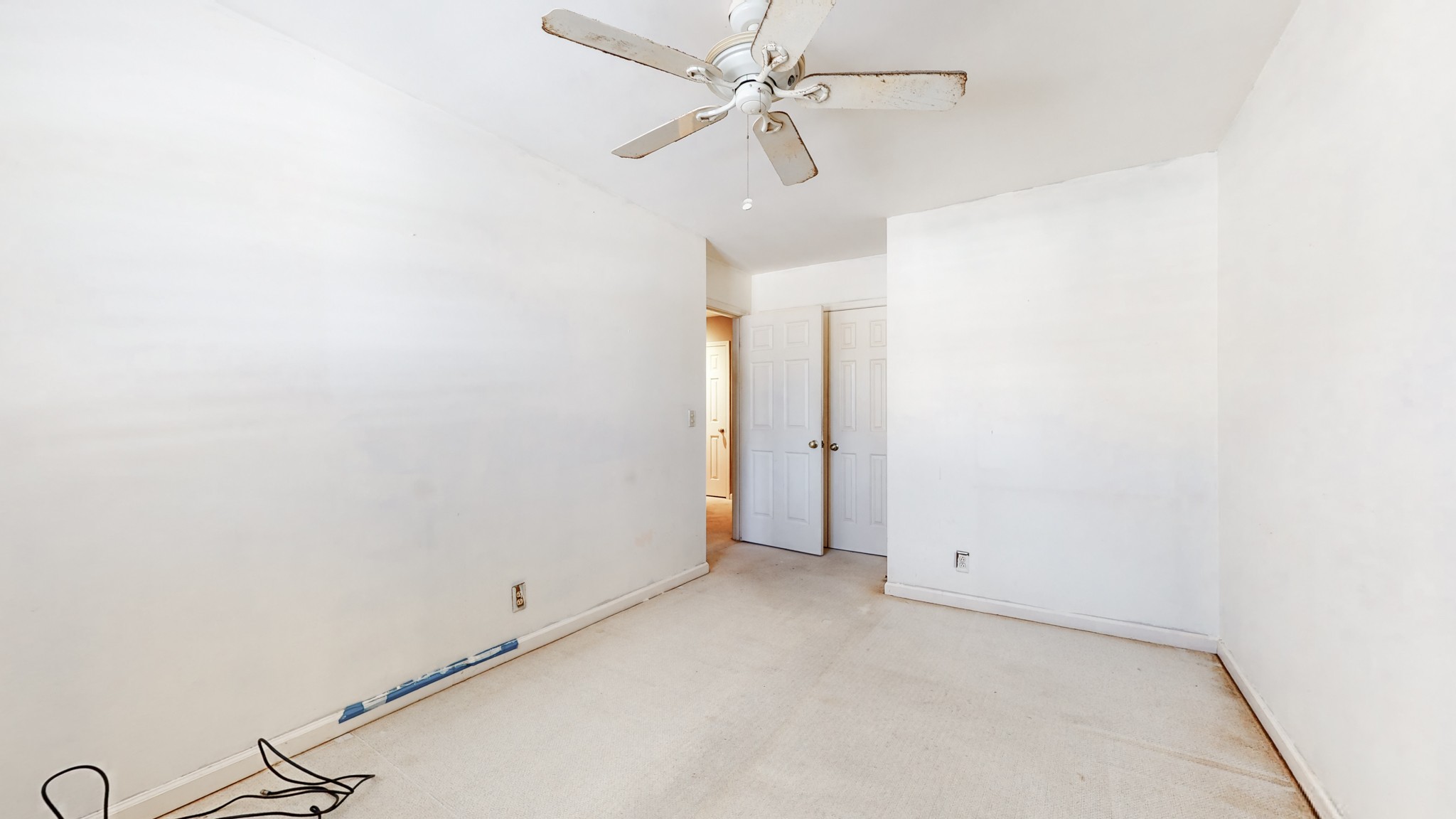 1034 General George Patton Road Nashville, TN 37221 - Photo 45 of 52 an empty room with a ceiling fan and a window