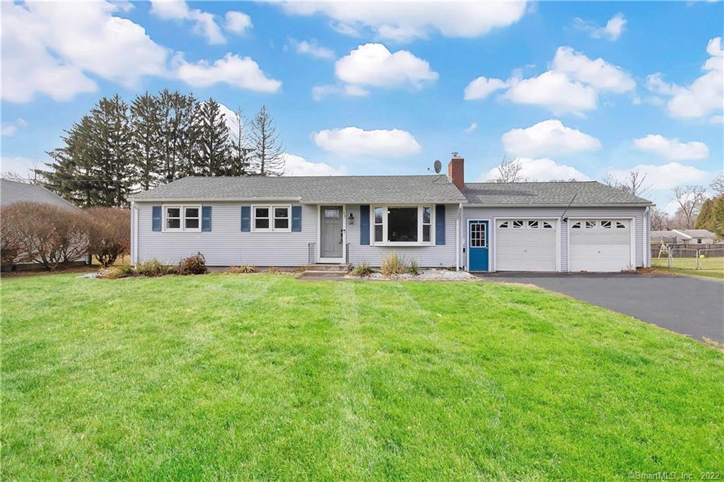 11 Fairlane Road Enfield, CT 06082 - Photo 1 of 1 a front view of a house with yard and green space