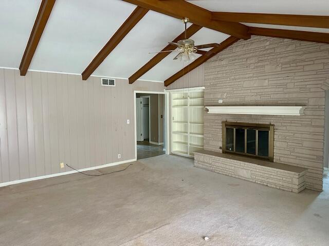 4503 14th Street Lubbock, TX 79416 - Photo 11 of 17 a view of an empty room with a fireplace and a window