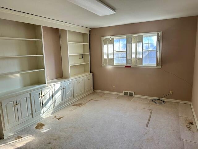 4503 14th Street Lubbock, TX 79416 - Photo 12 of 17 a view of an empty room with a window