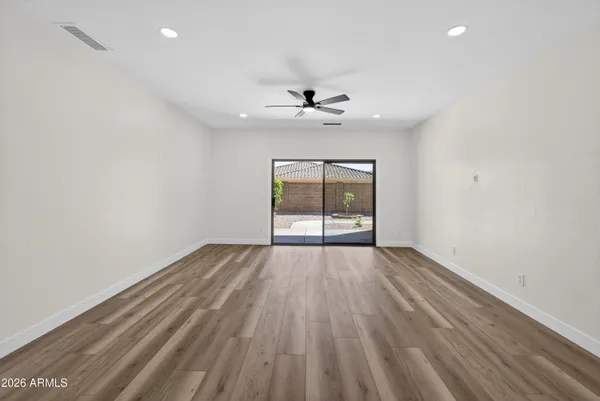 a large kitchen with stainless steel appliances granite countertop a lot of counter space and cabinets