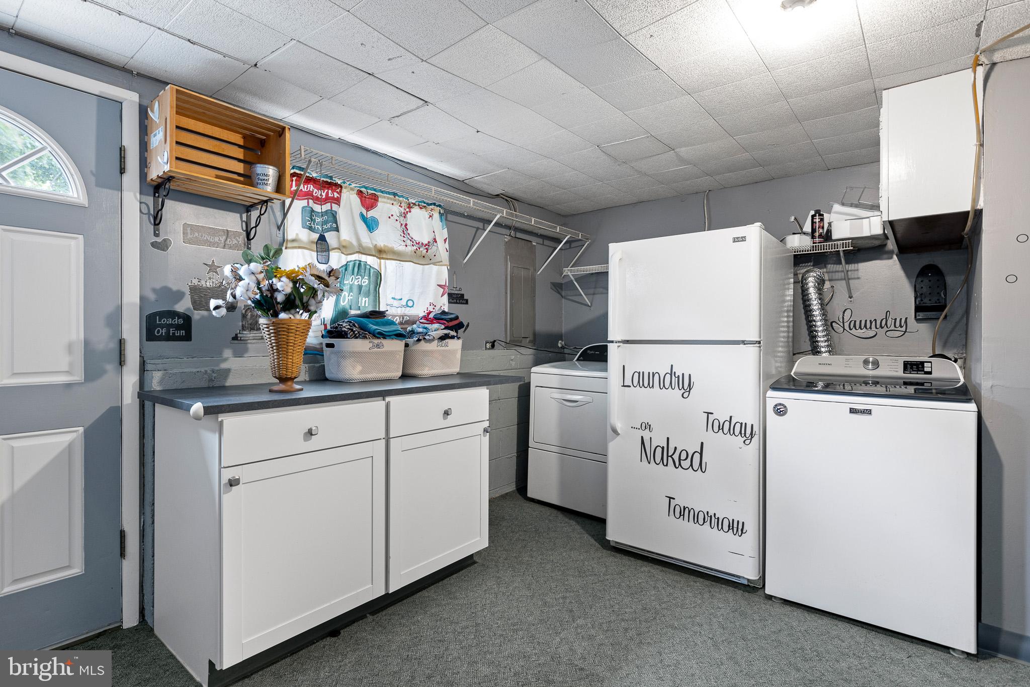 12 Carole Road Newark, DE 19713 - Photo 14 of 19 Laundry Room with additional cabinetry