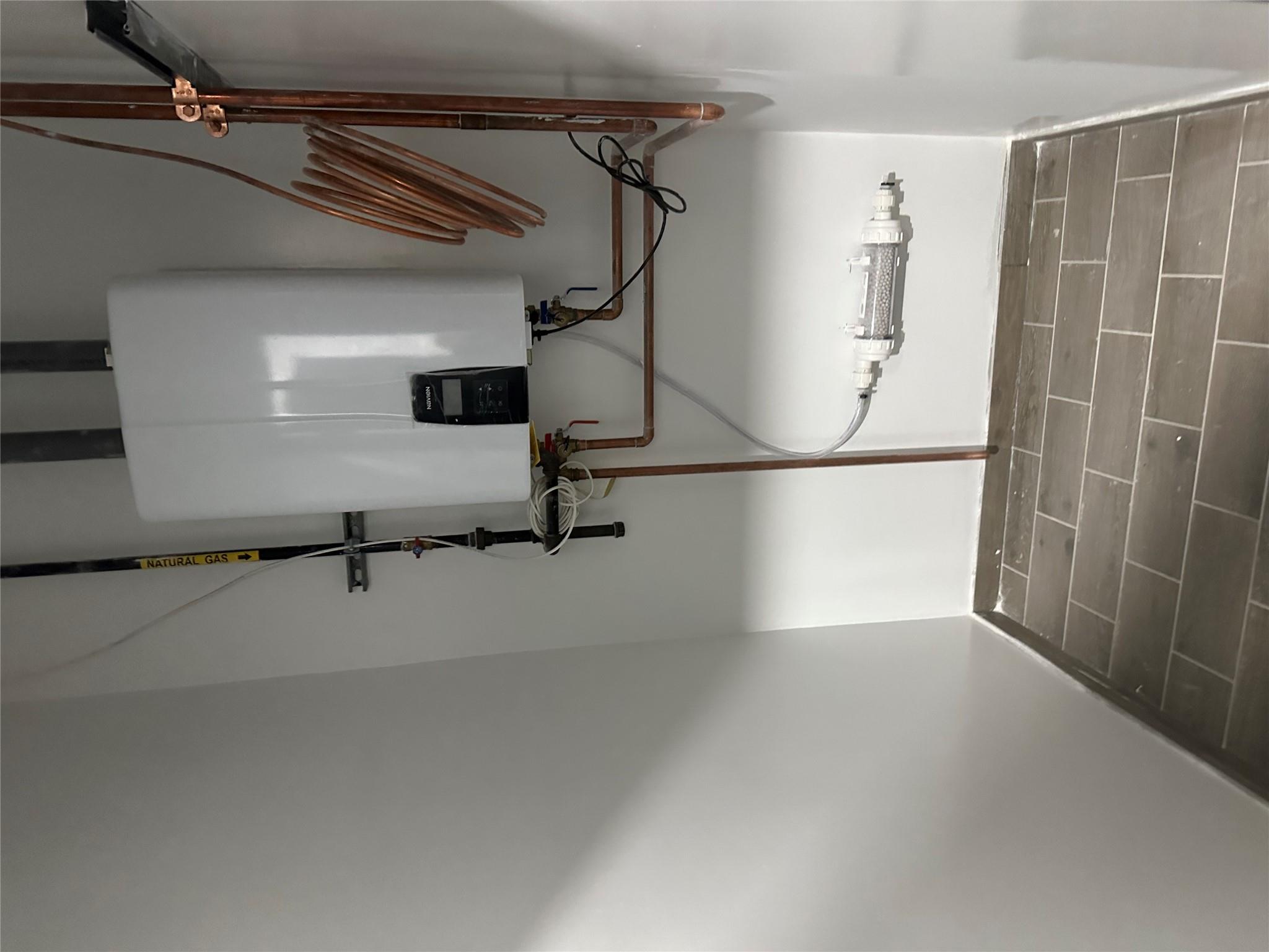 55-12 102nd Street Queens, NY 11368 - Photo 6 of 9 a view of empty room with wooden floor