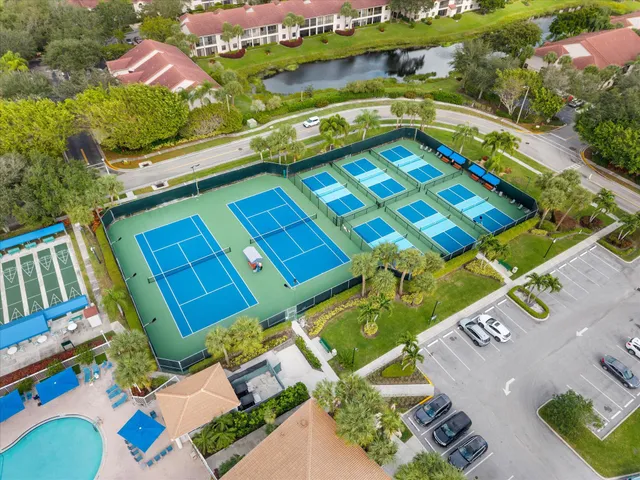 a view of swimming pool with a yard
