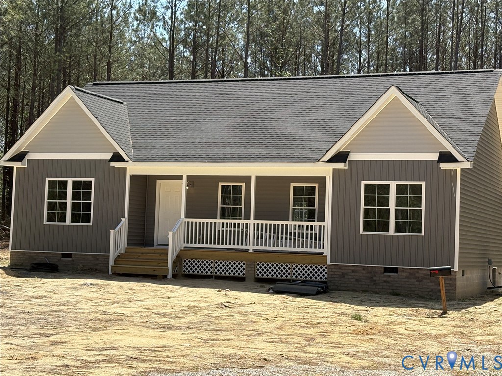 24178 Cabin Point Road Waverly, VA 23890 - Photo 2 of 14 a house view with a garden space