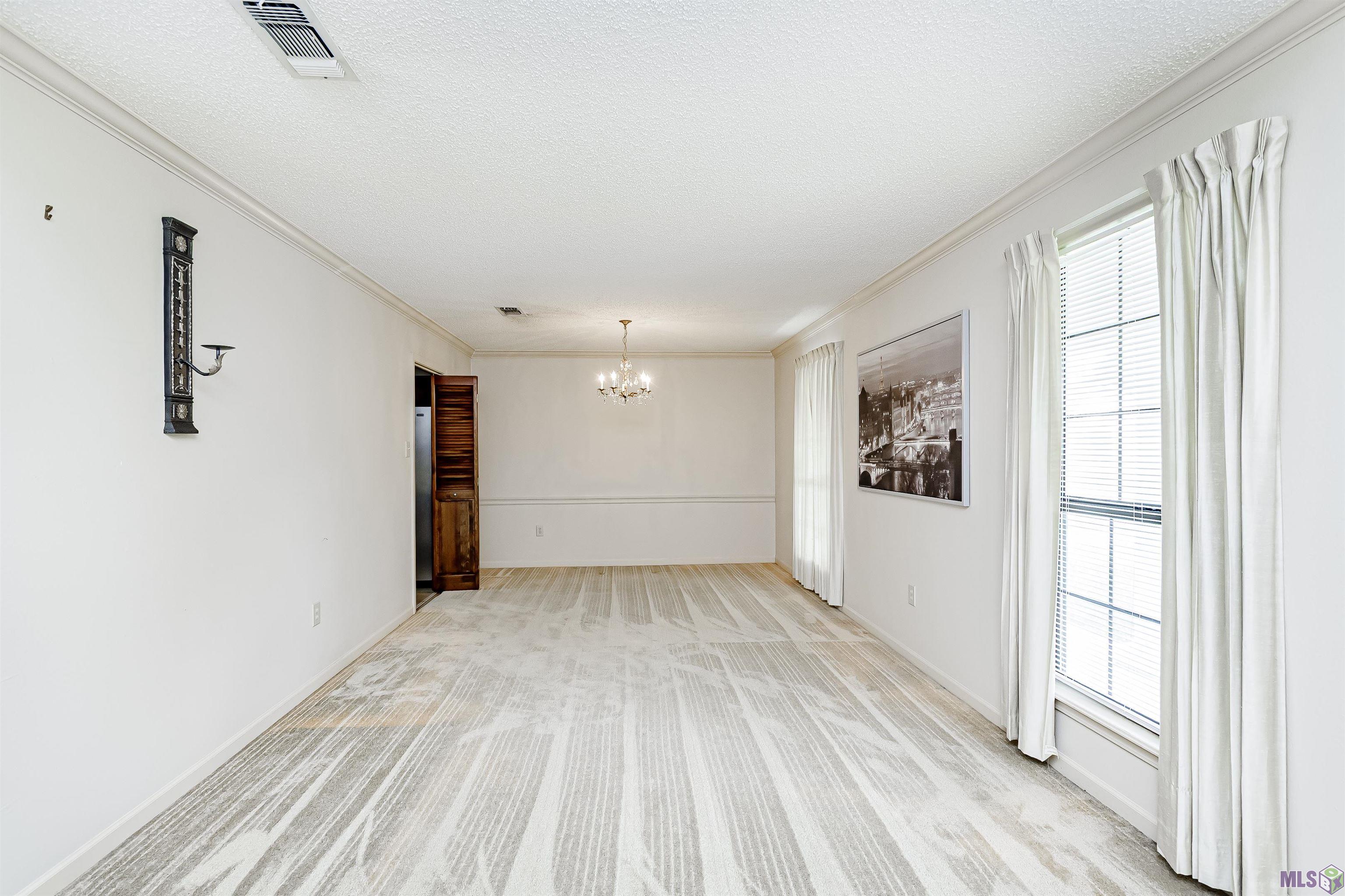 12324 Schlayer Avenue Baton Rouge, LA 70816 - Photo 3 of 36 Formal Dining & Living Room