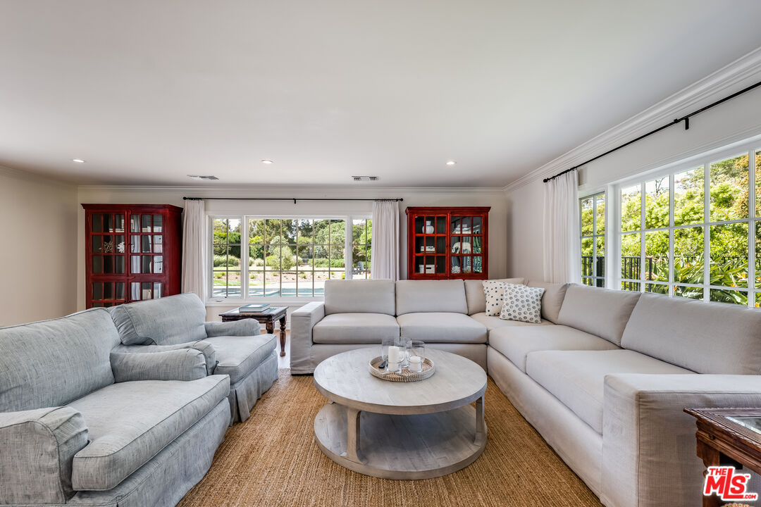 28925 Cliffside Drive Malibu, CA 90265 - Photo 16 of 62 a living room with furniture and a large window