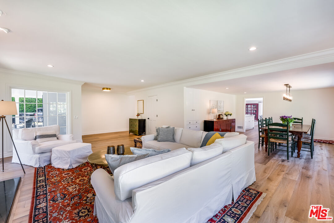 28925 Cliffside Drive Malibu, CA 90265 - Photo 21 of 62 a living room with furniture and wooden floor