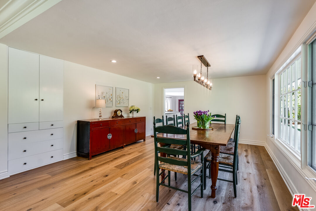 28925 Cliffside Drive Malibu, CA 90265 - Photo 22 of 62 a view of a dining room with furniture and window