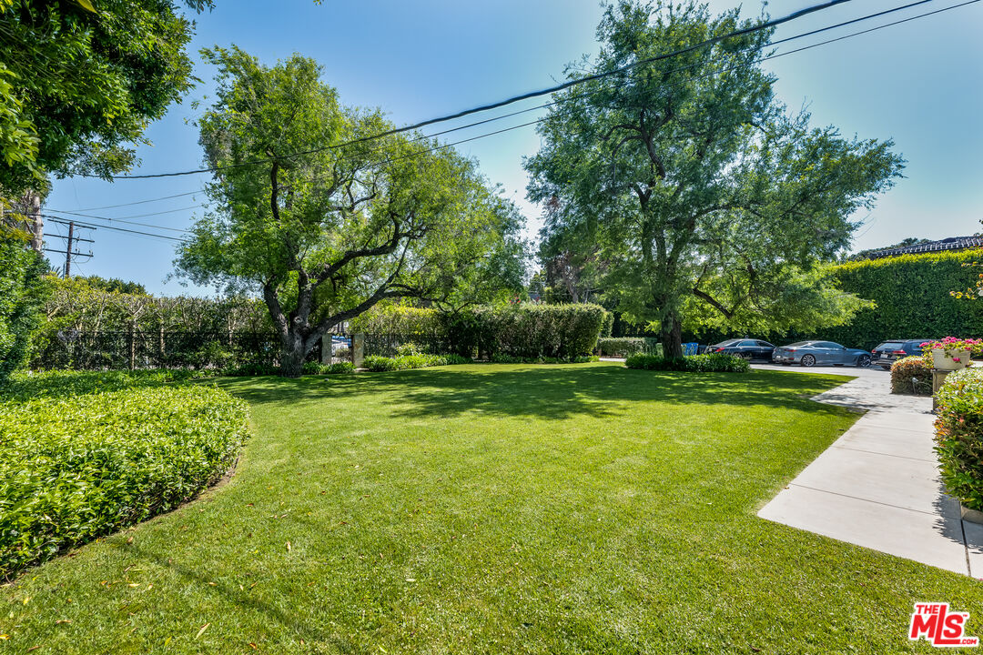 28925 Cliffside Drive Malibu, CA 90265 - Photo 44 of 62 a view of a swimming pool with a yard