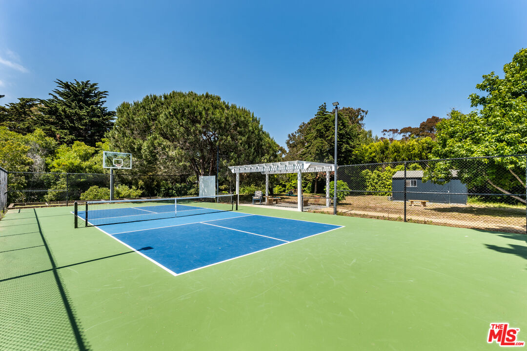 28925 Cliffside Drive Malibu, CA 90265 - Photo 48 of 62 a view of a house with swimming pool and sitting area