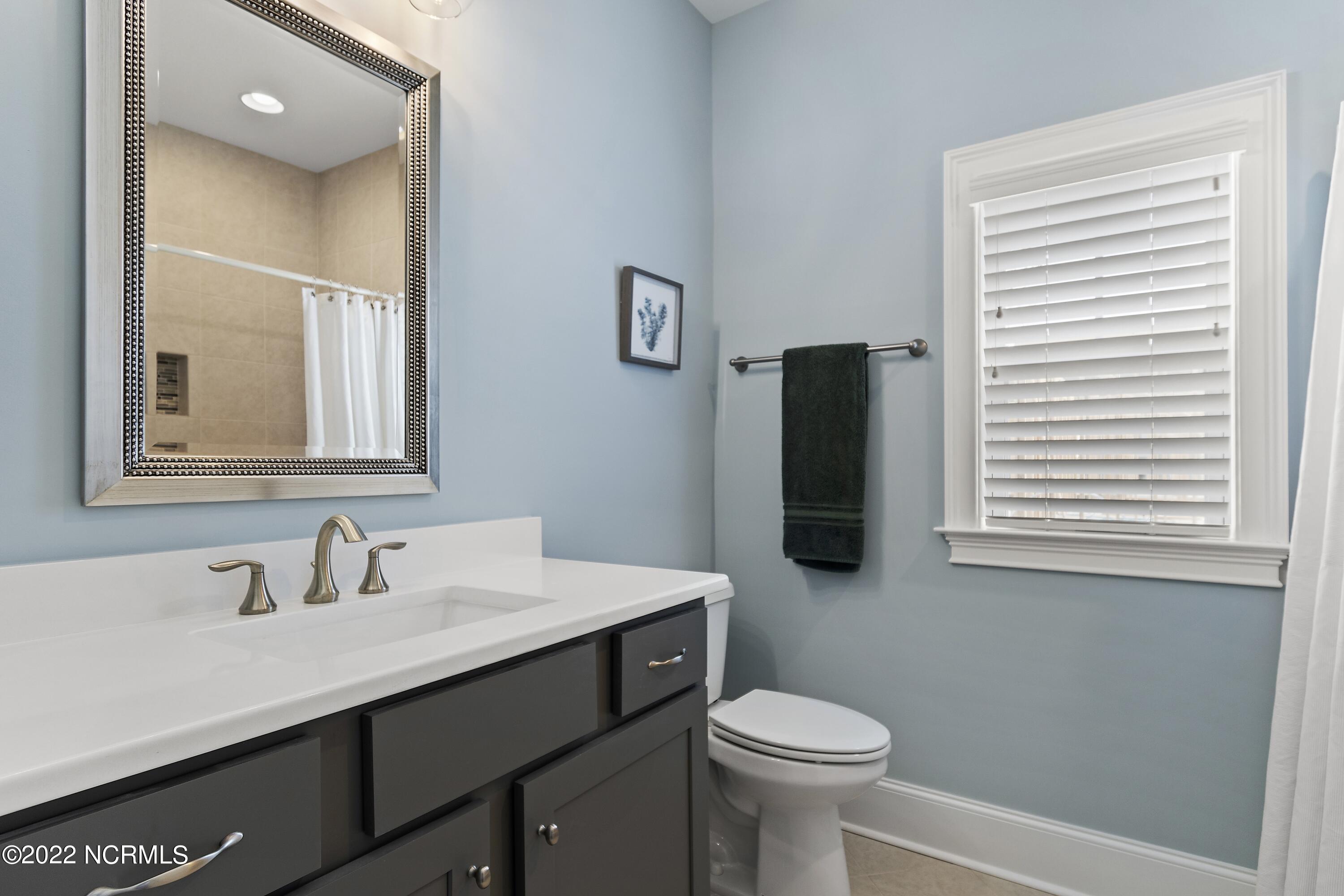 149 Clubhouse Road Sunset Beach, NC 28468 - Photo 22 of 61 Guest bath