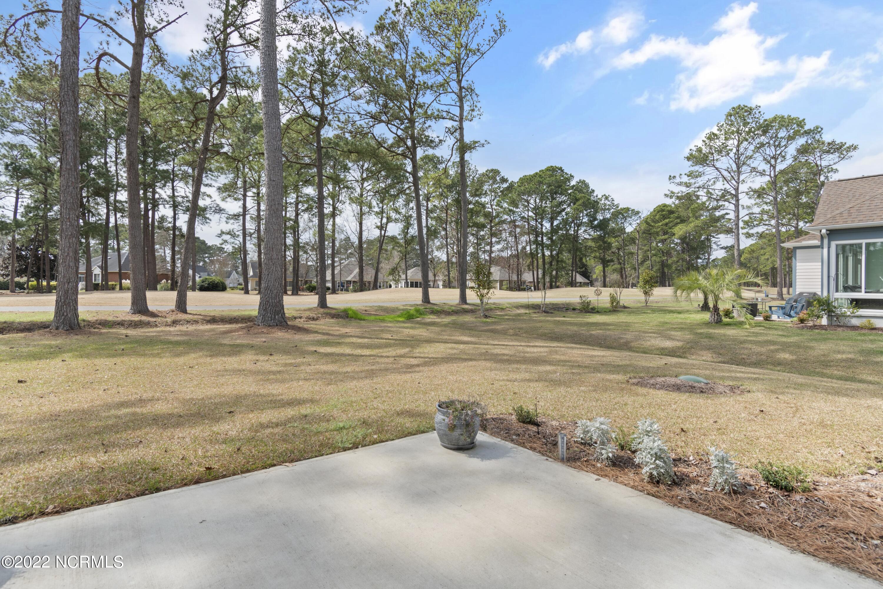 149 Clubhouse Road Sunset Beach, NC 28468 - Photo 32 of 61 Patio