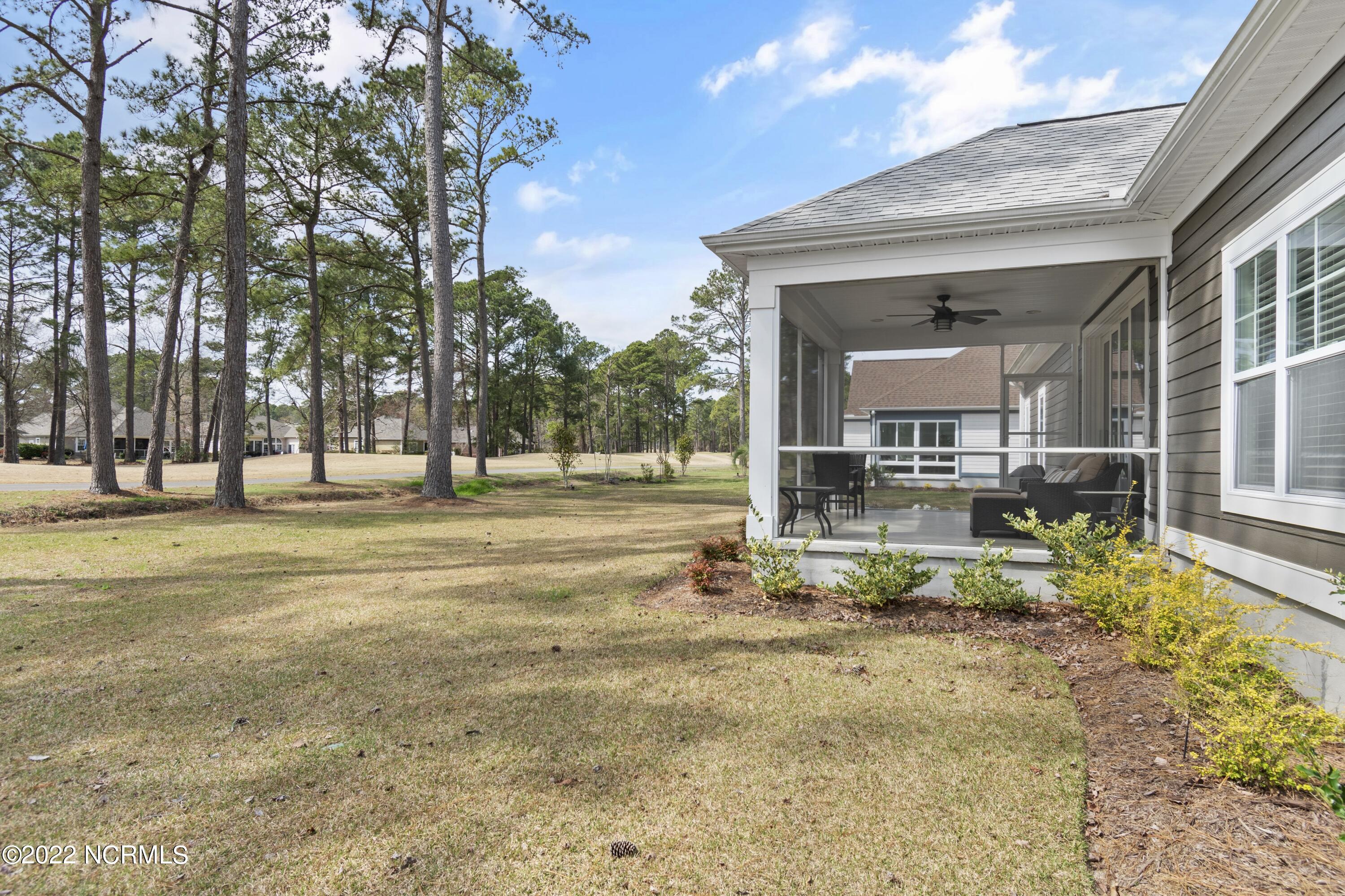 149 Clubhouse Road Sunset Beach, NC 28468 - Photo 33 of 61 Backyard