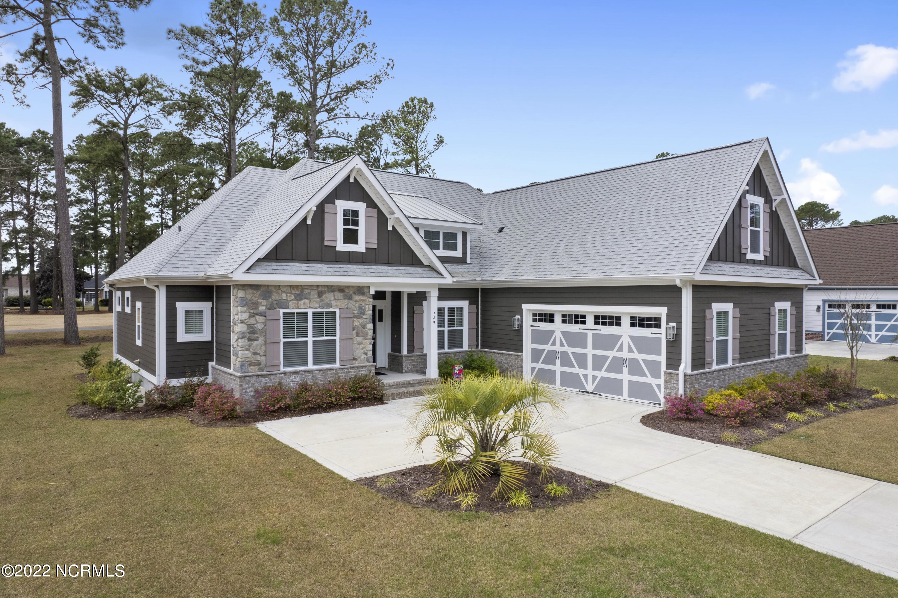 149 Clubhouse Road Sunset Beach, NC 28468 - Photo 38 of 61 Aerial front