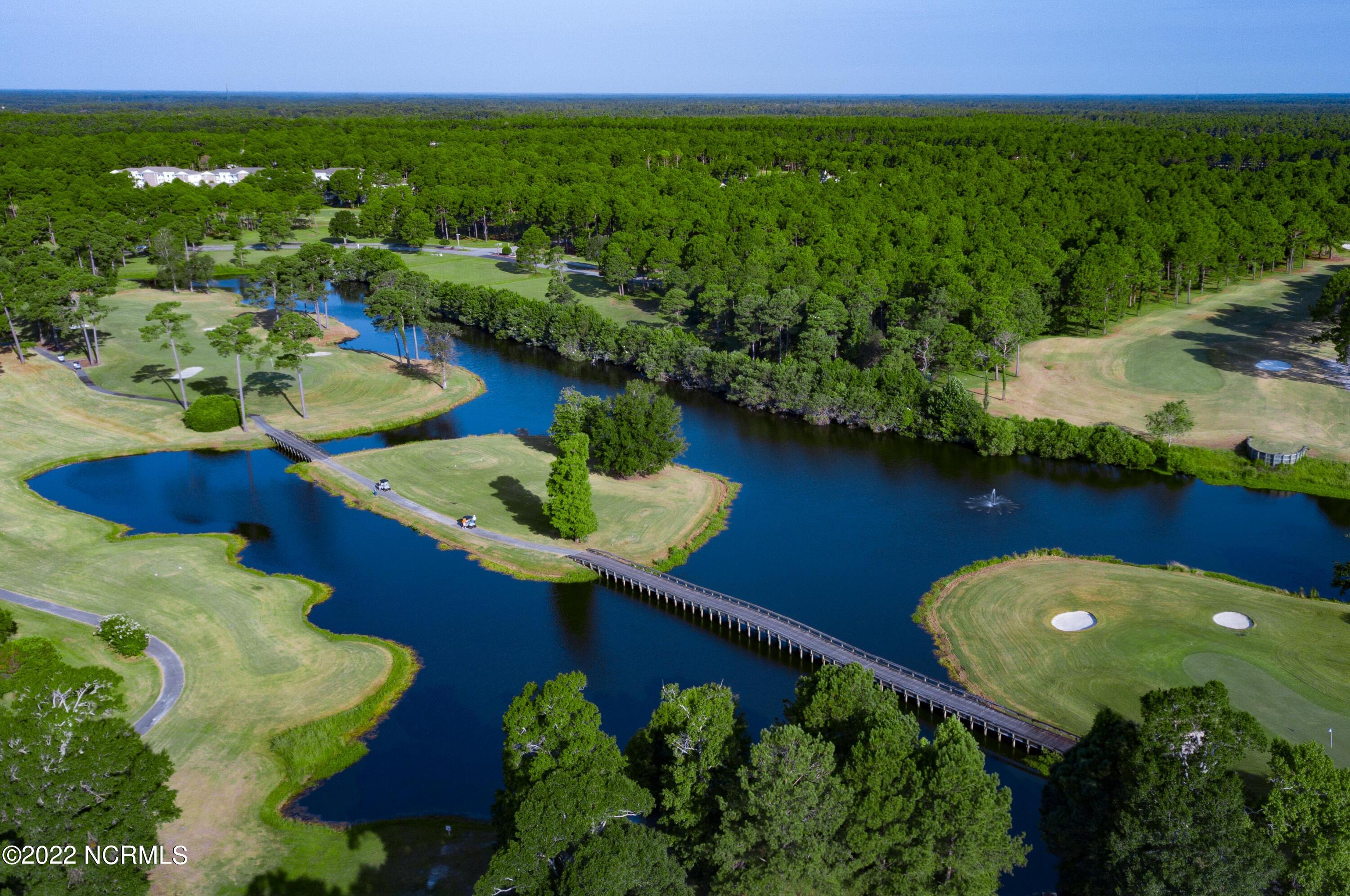 149 Clubhouse Road Sunset Beach, NC 28468 - Photo 41 of 61 aerial-golf