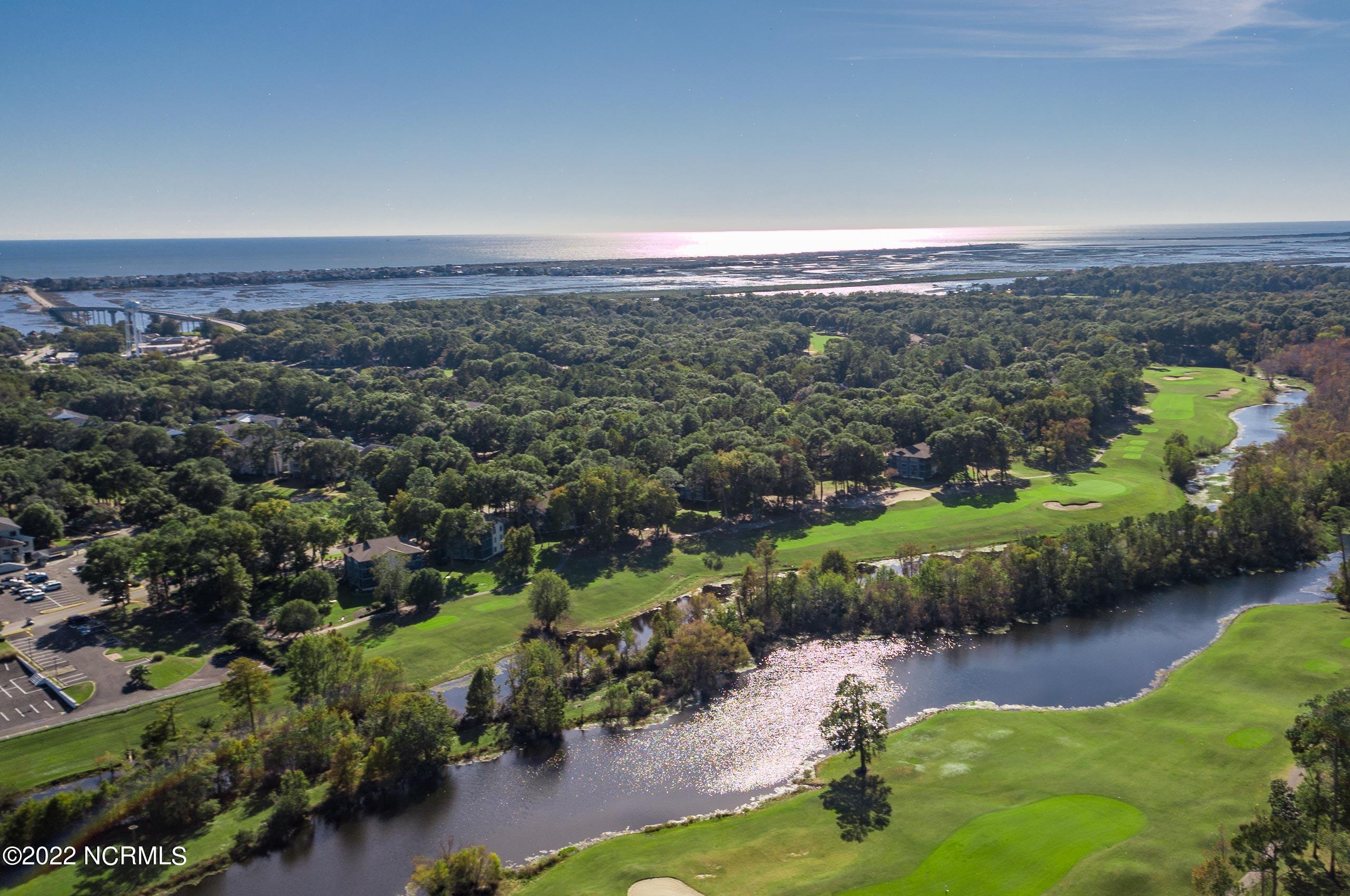149 Clubhouse Road Sunset Beach, NC 28468 - Photo 42 of 61 golf-and-ocean-aerial
