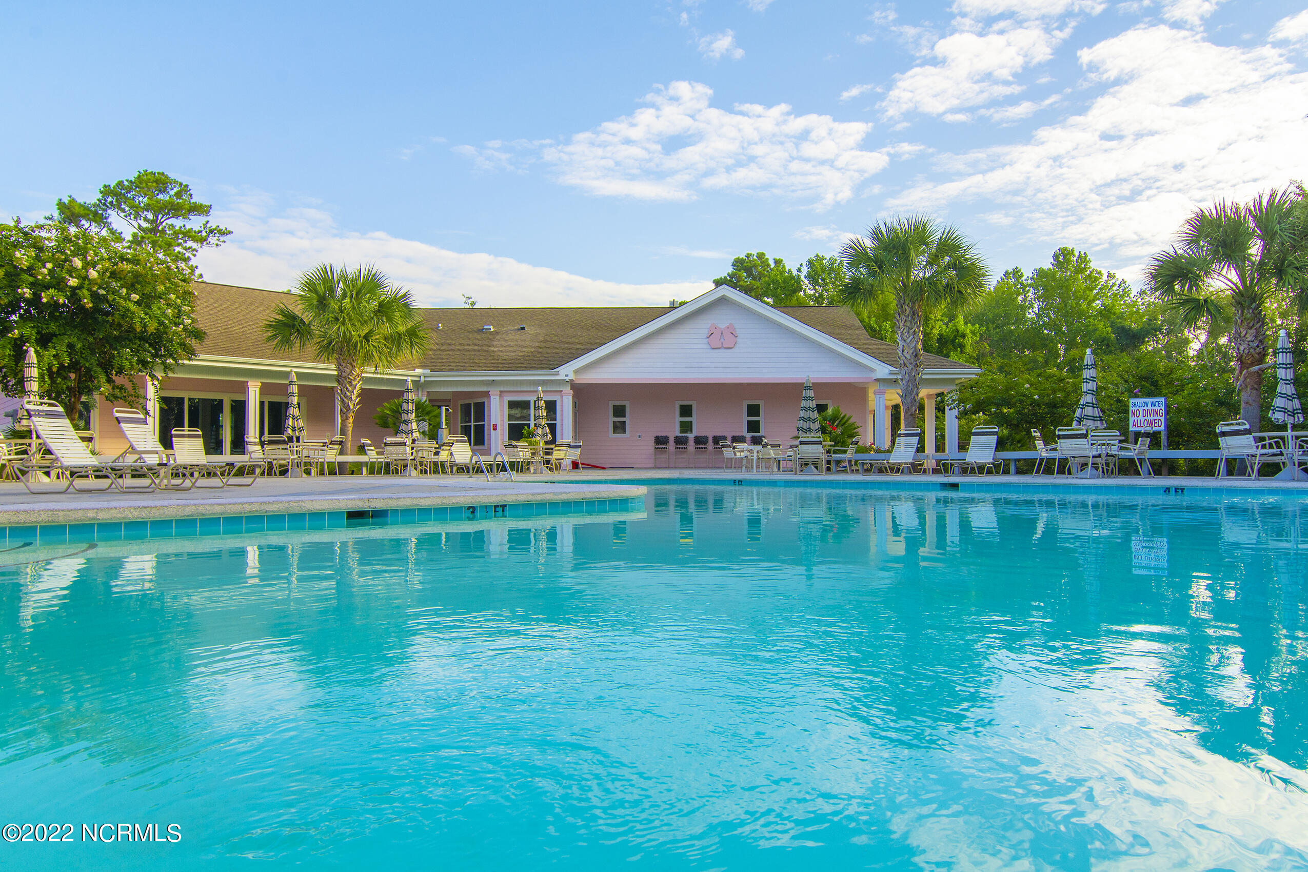 149 Clubhouse Road Sunset Beach, NC 28468 - Photo 53 of 61 pink-palace-pool