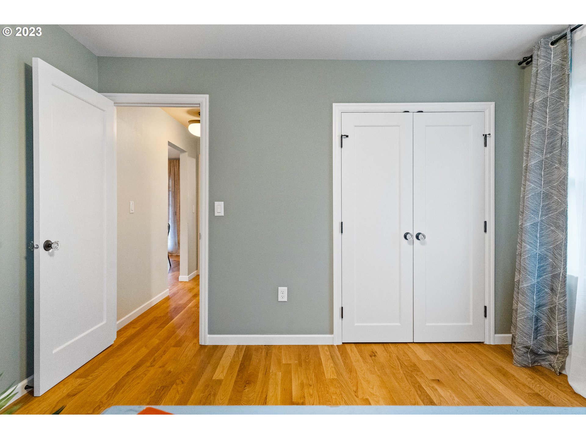 1565 18th Street Northeast Salem, OR 97301 - Photo 18 of 41 a view of an empty room with wooden floor