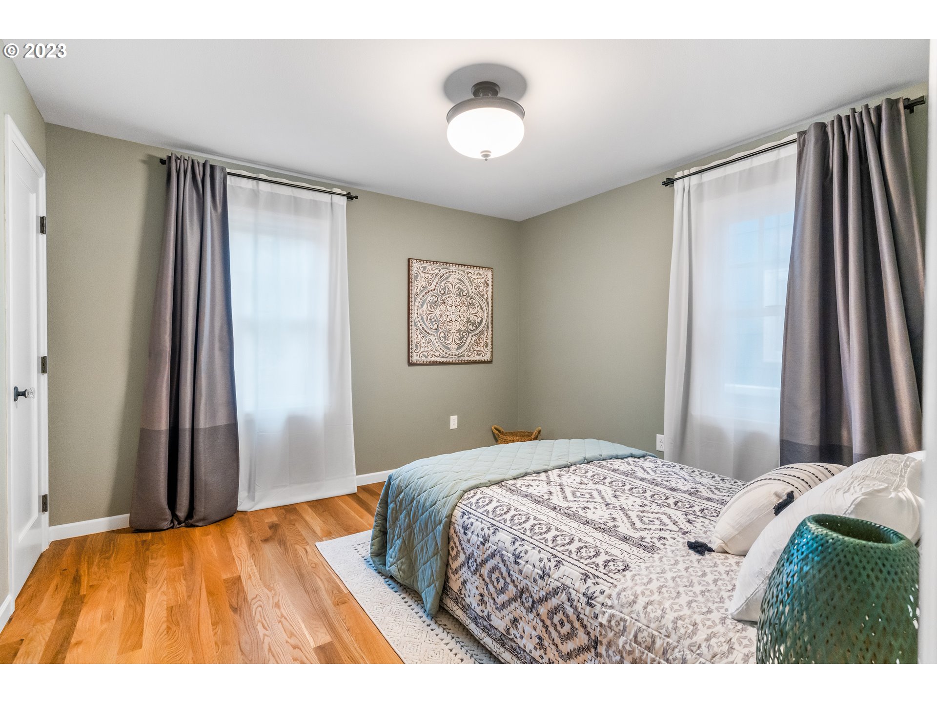1565 18th Street Northeast Salem, OR 97301 - Photo 21 of 41 a bedroom with a bed and a window