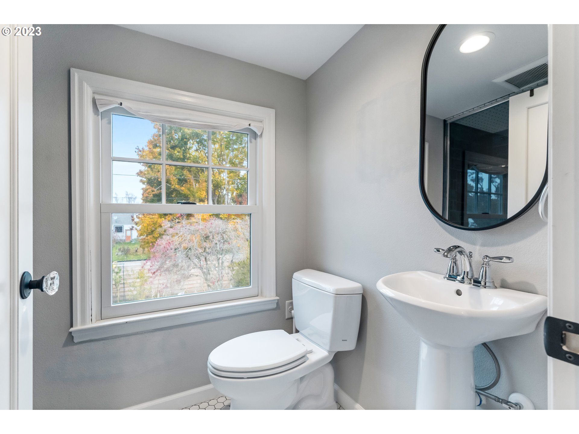 1565 18th Street Northeast Salem, OR 97301 - Photo 24 of 41 a bathroom with a sink and a mirror