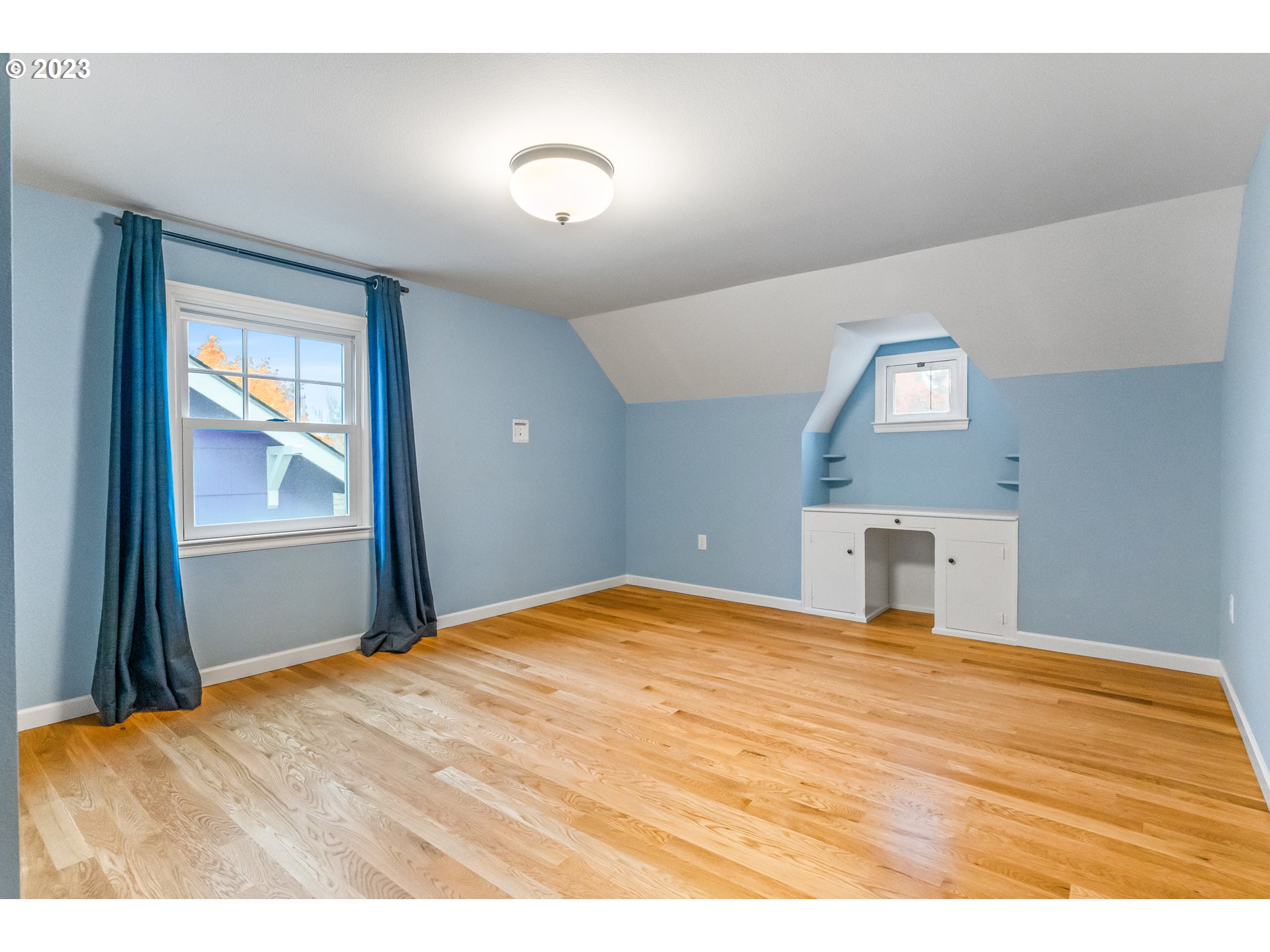 1565 18th Street Northeast Salem, OR 97301 - Photo 25 of 41 a bedroom with a bed and a window