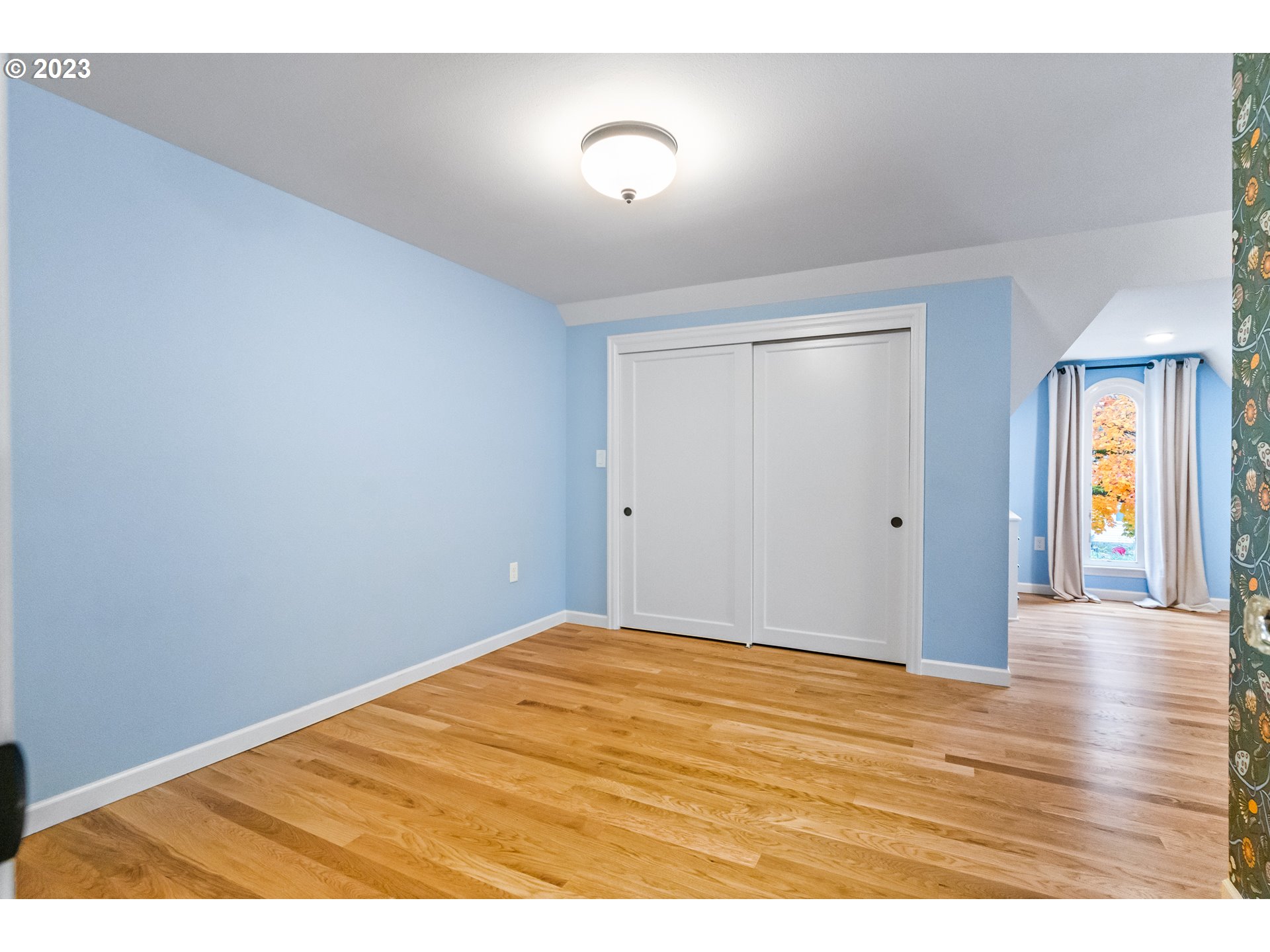 1565 18th Street Northeast Salem, OR 97301 - Photo 28 of 41 a view of an empty room with wooden floor